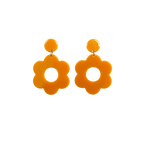A pair of light brown bold and playful statement earrings in a retro-inspired daisy flower design. The earring has a large, light brown acrylic flower with a circular cutout center, hanging from a matching light brown circular stud. The petals are rounded, giving off a fun, 70's style playful vibe!!