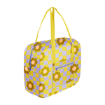 A picture of a cute, large stowaway bag with a warped checkerboard pattern in citron and periwinkle with camel colored daisies scattered about and citron handle straps, small zipper pouch on right side of bag.