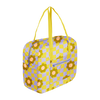 A picture of a cute, large stowaway bag with a warped checkerboard pattern in citron and periwinkle with camel colored daisies scattered about and citron handle straps, small zipper pouch on right side of bag.