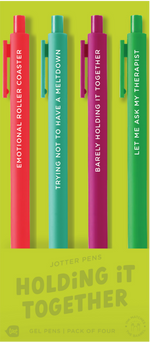 4 Toot Jotter pens in their citron Holding it together toot packaging. Neon coral jotter says "Emotional roller coaster", Teal jotter says "trying not to have a meltdown", Pink jotter says "barely holding it together", grass green jotter says "let me ask my therapist"