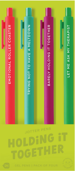 4 Toot Jotter pens in their citron Holding it together toot packaging. Neon coral jotter says "Emotional roller coaster", Teal jotter says "trying not to have a meltdown", Pink jotter says "barely holding it together", grass green jotter says "let me ask my therapist"