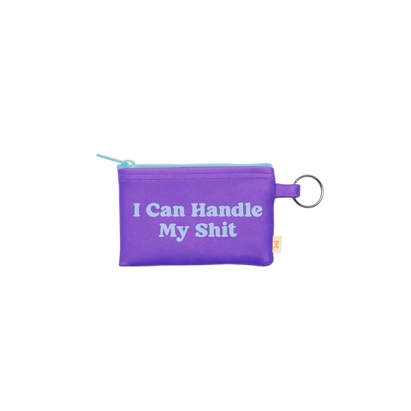 A super useful small zippered pouch featuring a gold key ring. The pouch has the saying "I Can Handle My Shit" written in light blue and the pouch color itself is a vibrant purple.
