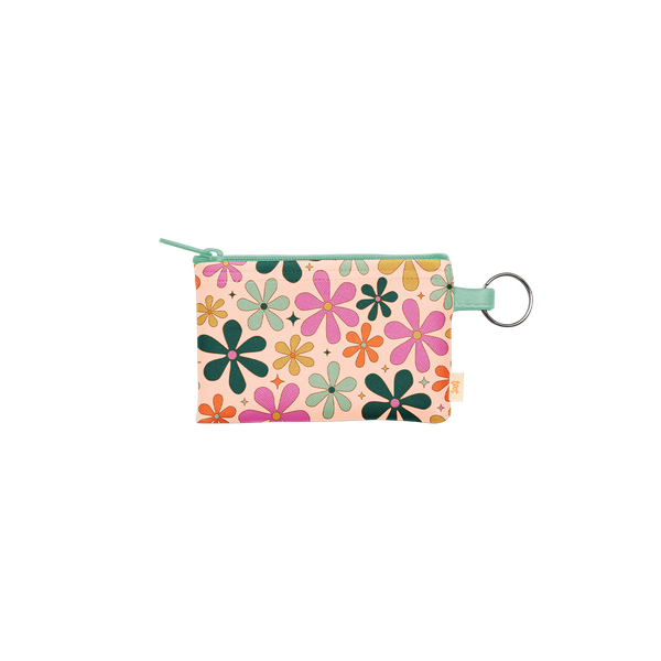 Colorful floral print zippered pouch with key ring and pastel green zipper, featuring retro-style multicolored flowers on a light pink background. 