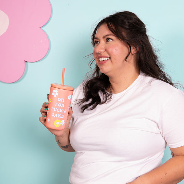 Because some days just require a little extra sass. The Oh For Fck’s Sake* Cold Cup is your go-to companion for keeping it cool—literally and emotionally. With playful daisy details and a pastel peach finish, this cup delivers attitude wrapped in cuteness. It’s double-walled to keep your drinks cold and your hands dry, with a secure lid and matching straw that are perfect for sipping your iced coffee, matcha, or wine in disguise. Whether you're venting at your desk or running errands, this cup says what you