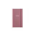 Muave notebook with baby pink text that says "Manifest That Shit" on the front with a maroon elastic band.