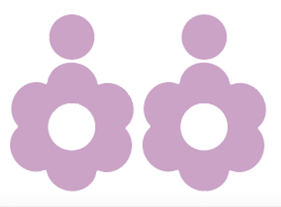 A pair of purple bold and playful statement earrings in a retro-inspired daisy flower design. The earring has a large, purple acrylic flower with a circular cutout center, hanging from a matching green circular stud. The petals are rounded, giving off a fun, 70's style far out vibe!!
