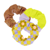 Trippy Dippy Scrunchie Set
This playful 3-pack of scrunchies features bold, retro-inspired patterns that make a statement. One has chocolate brown with pastel smiley faces, another showcases a neon yellow and lavender color block design, and the third bursts with groovy 70s-style yellow daisies over a lavender checkered pattern. The perfect accessory to add a fun pop to any outfit or hairstyle.
