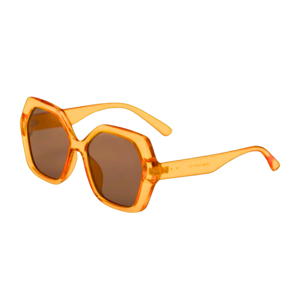A pair of retro-inspired design, oversized hexagonal sunglasses with dark brown tinted lenses and translucent orange frames and arms.