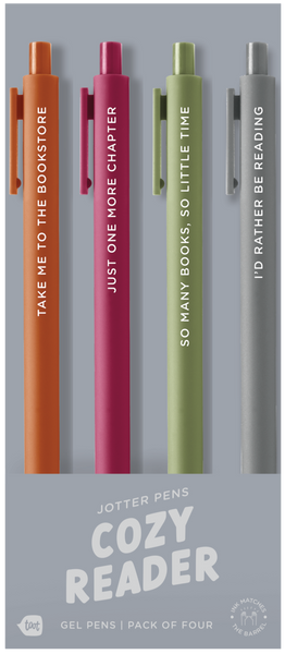 4 Toot Jotter pens in their grey Cozy reader toot packaging. Sienna jotter says "Take me to the bookstore", Sangria jotter says "Just one more chapter", Olive jotter says "so many books, so little time", gray jotter says "I'd rather be reading"