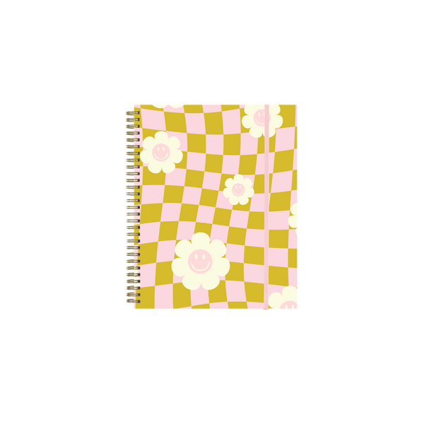 Flower Check Bullet Journal
Stay cute and chaotic with this trippy checkerboard journal. The wavy mustard-and-pink grid gives off major retro vibes, while the pastel smiley flowers keep things cheerful even when your to-do list doesn’t. Spiral-bound and ready for doodles, dreams, or passive-aggressive meeting notes.