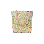 Colorful pastel kaleidoscope floral puffy tote with a pink strap 
