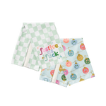 Bring the holiday cheer with a side of attitude. This tea towel duo includes a minty fresh checkered towel boldly stating "festive as fck"* and a second towel covered in pastel smiley-faced ornaments that scream merry and bright (with a wink). Made for holiday hosts who serve sass with their sugar cookies, these towels are both functional and fabulous—perfect for decking your kitchen with zero chill.