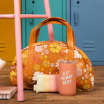 Gym bag with hot/cold tumbler in light orange that reads "is it Friday yet?"
