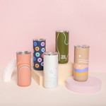 The "Over It," "Daisy," "Chill Hills," "Probably late for something," and "Over Caffeinated, Under Appreciated ," 16 oz. Everyday Tumblers displayed in front of a millennial pink background