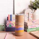 Desk setup with "Over Caffeinated Under Appreciated" 16 oz tumbler with 2 TOOT pens, TOOT stickers, and small notepad. 