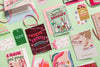 Layout of various holiday cards and gift tags