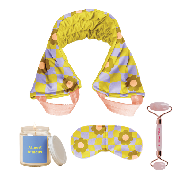 Periwinkle and neon green checkers neck wrap and eye pillow with a neon green "almost famous" candle with blue and a pink face roller. 