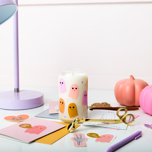 Halloween candle can glass with small ghosts with heart eyes in shades of pink, purple and orange 
