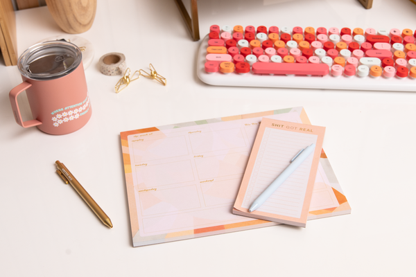 1 Large desk tearaway week pad; 1 small notepad; 2 TOOT pens; 1 washi tape; 1 camp mug