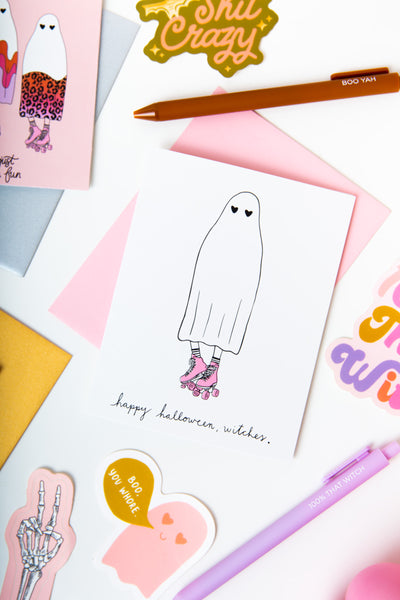 Halloween Greeting card with ghost in roller skates saying "happy halloween, witches"