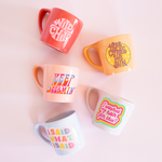 collection of coffee mugs with funny sayings 
