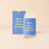 16 oz candle can glass with blue decal and text that reads 