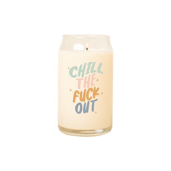 A 16 oz. candle with Chill The Fuck Out printed on the front in different colored lettering.