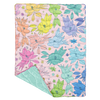 A multicolored, quilted floral puffy blanket with a solid light blue back side. Flowers are varying in shape and size.