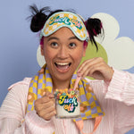 Checked Daisy Neck Wrap + “F*ck Off” Sleep Mask
Wake, slay, and nap all day with this unapologetically bold wellness duo. The Checked Daisy Neck Wrap brings retro flower power in soft pastels, with a soothing design perfect for heat or cold therapy. Paired with the cheeky “F*ck Off” Sleep Mask in matching checkerboard style, you’ll make it clear you're not to be disturbed—fashionably. Whether it’s self-care Sunday or you just need to block the world out, this set’s got your back (and your eyes).