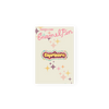 A Capricorn Enamel Pin in yellow lettering with a dark mauve background. Perimeter lining of pin is mint, pastel orange, pastel pink, and lilac.