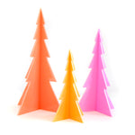 three acrylic trees one large in coral, one medium in pink and one small in orange.